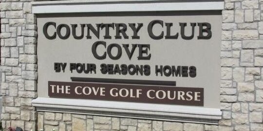 Country Club Cove Welcome Sign